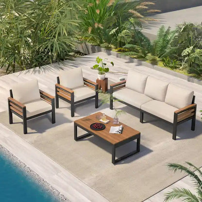 Ensemble de canapés modulaires d'extérieur 4 pièces, ensemble de meubles de conversation de patio toutes saisons avec coussin et table basse en bois massif