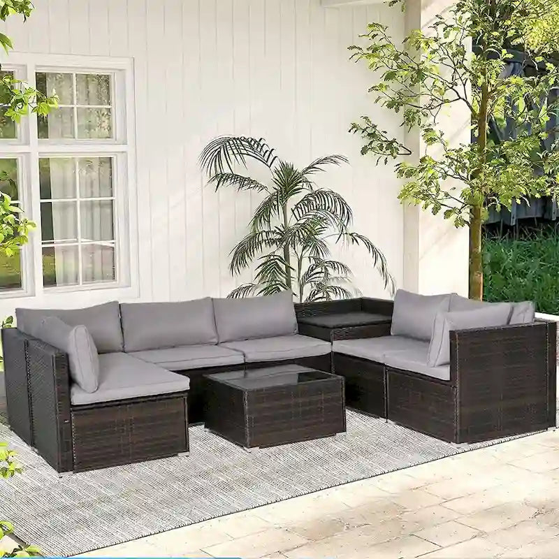 Ensemble de mobilier de jardin 8 pièces en rotin marron et gris avec 6 canapés, 1 table basse, un coffre de rangement et des coussins