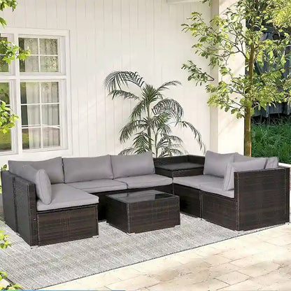 Ensemble de mobilier de jardin 8 pièces en rotin marron et gris avec 6 canapés, 1 table basse, un coffre de rangement et des coussins