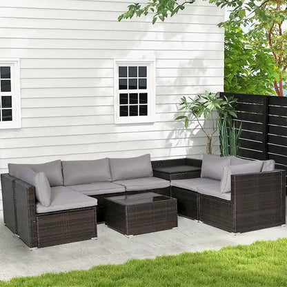 Ensemble de mobilier de jardin 8 pièces en rotin marron et gris avec 6 canapés, 1 table basse, un coffre de rangement et des coussins